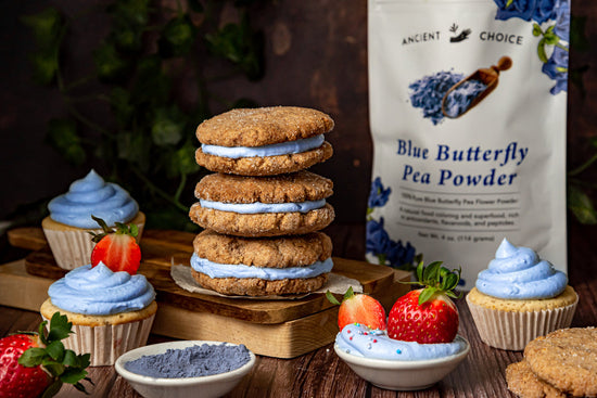 Blue coconut cream frosting on cupcakes and sandwich cookies with Butterfly Pea Flower Powder